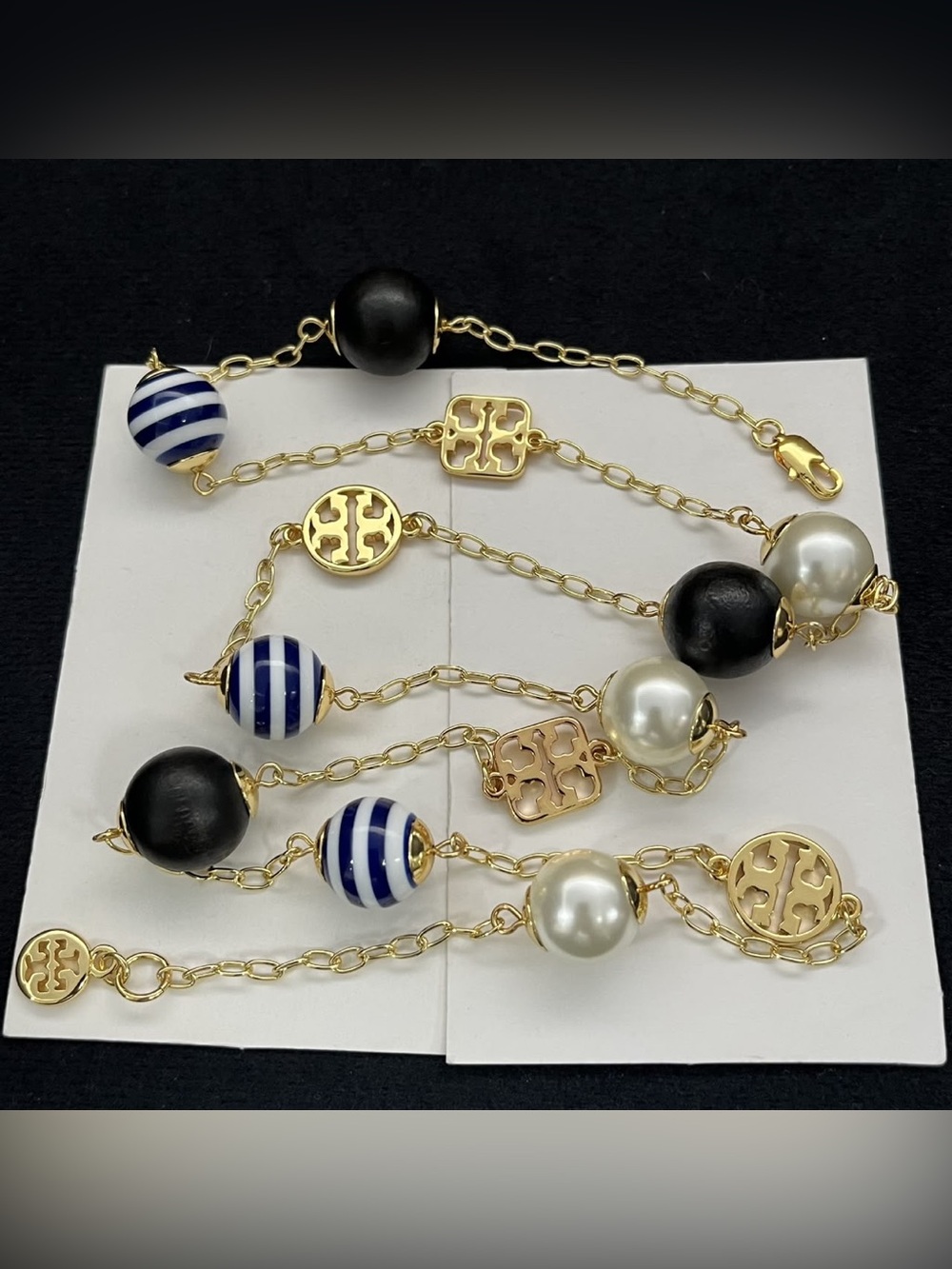 Tory Burch Gold Chain Necklace with Black, White, and Navy Striped Beads
